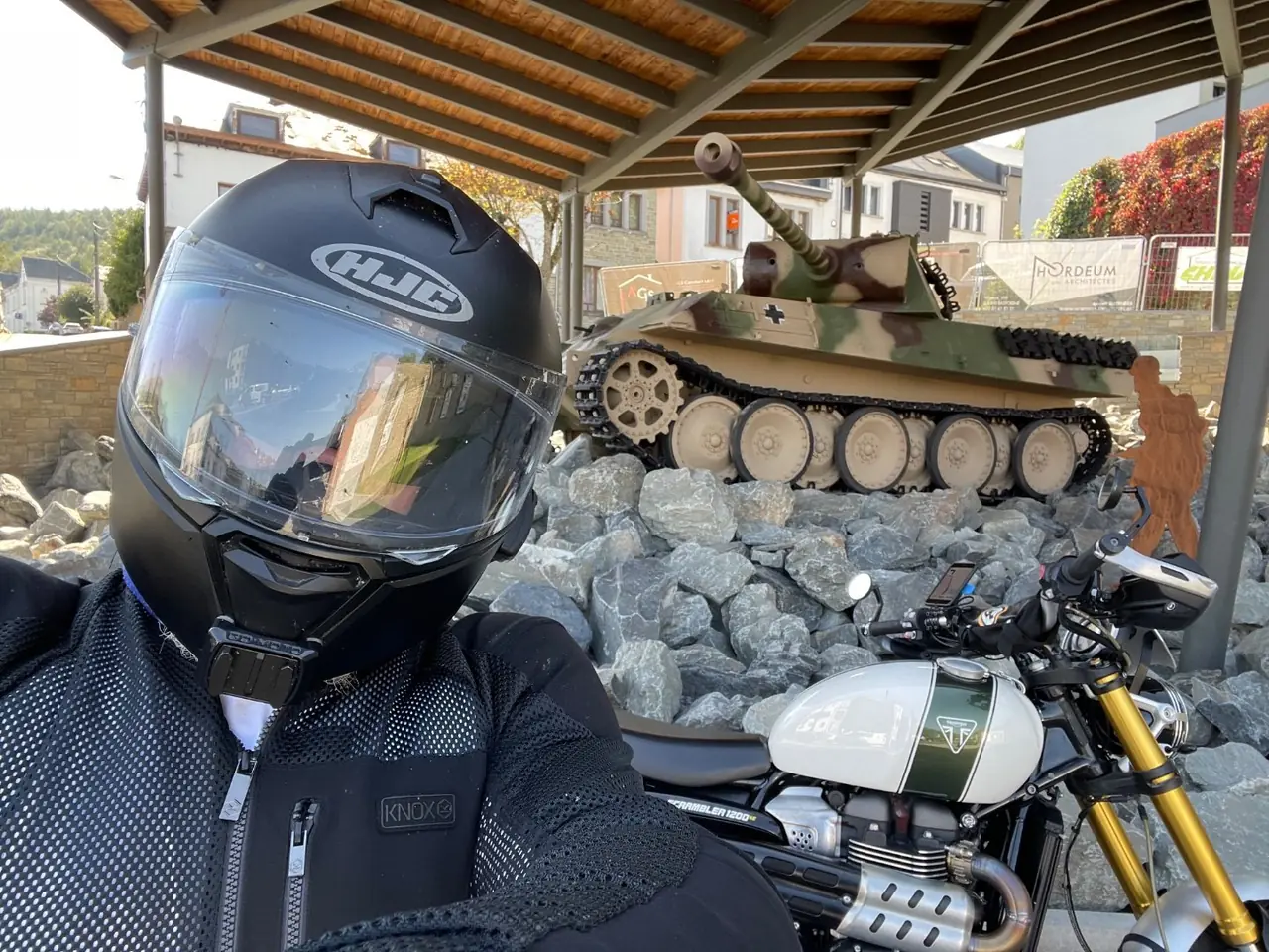 Rider in a HJC helmet beside the Panther tank monument at Houffalize in the Ardennes