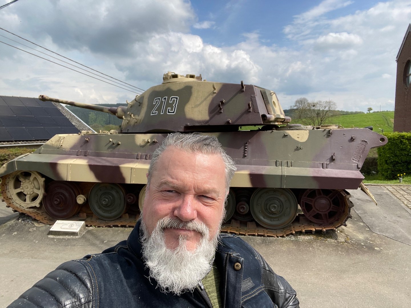 Alan Jones in front of the Tiger II turret number 213 at La Gleize in the Belgian Ardennes
