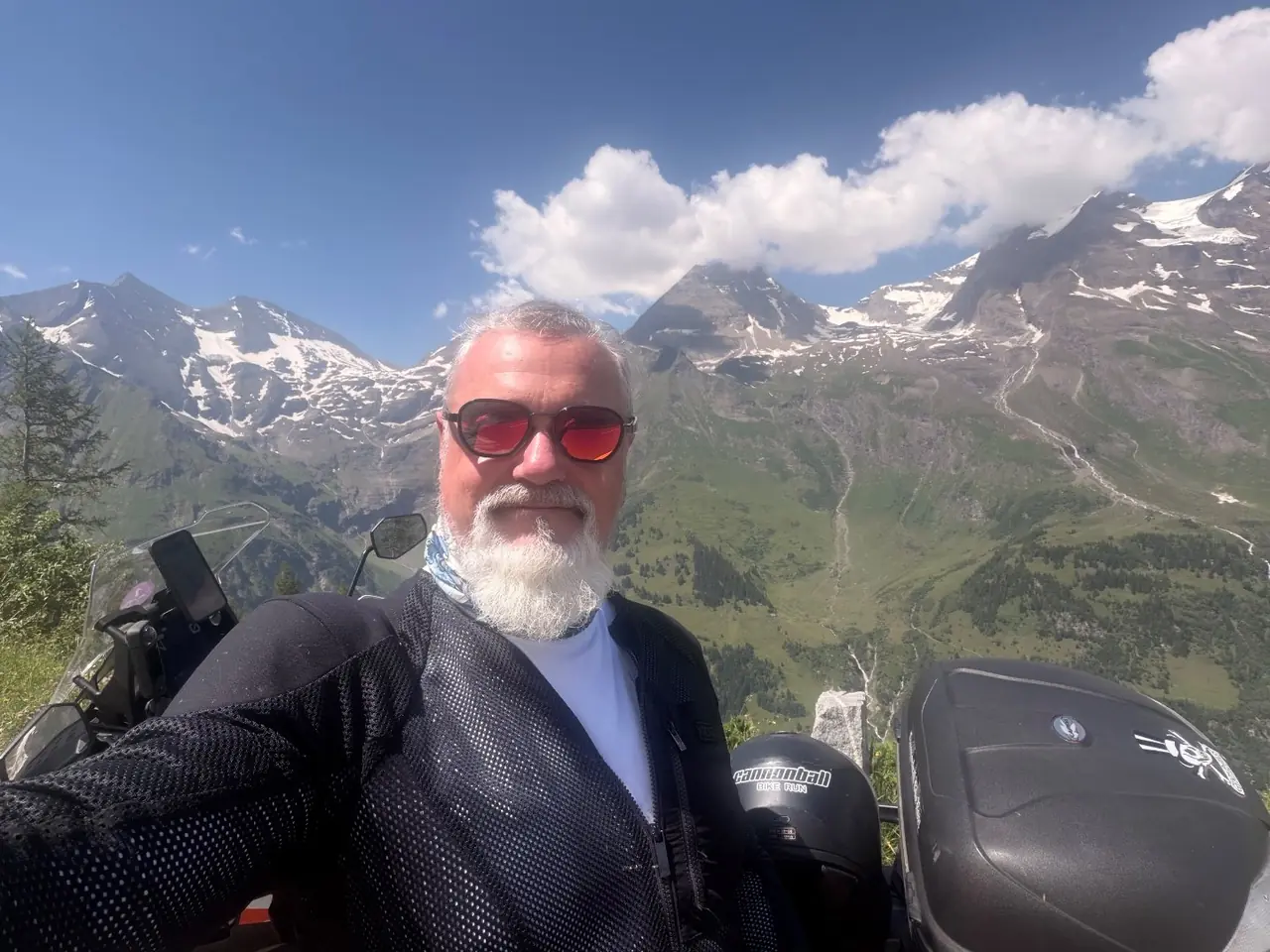 Alan Jones on the Grossglockner Hochalpenstrasse under clear blue skies